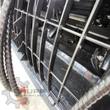 AGT cement mixer bucket, steel bag-cutter grille bars over the mixing paddles inside the drum, hydraulic hoses
