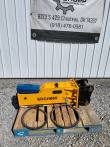 SDCH680 hydraulic breaker on a pallet, black mounting bracket, blue tool box and two coiled hoses