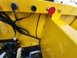 Mini dumper control panel, key ignition switch and red emergency stop button on the yellow dash
