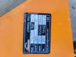 Arteer data plate on the orange shield: 31 in capacity, 860 lbs, 5,000 psi max pressure, 16-34 gpm flow range