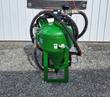 Green DB500 dustless blast pot on a two-wheel cart, tank inlet valve for water, coiled blast hose and air lines