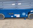 Genie GS-3232 chassis with lower control panel, emergency stop button, solid tires and lowered scissor stack