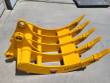 Yellow TOFT08R rake at an angle: pin-boss mounting frame, five curved tines and CAT320 on the edge