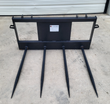 JCT four-spear hay bale spear, quick-attach frame and four forged tines, front view