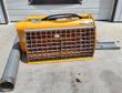 Yellow Landhonor cement mixer with gray safety grate, flexible discharge hose and discharge chute