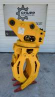 Yellow ALS1638 rotating grapple, jaws open, in front of a Chupp Industrial Inc. banner