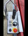 Skyjack scissor lift upper control box: drive joystick, lift toggles, battery charge gauge, horn and red e-stop