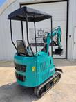 CFG H16R mini excavator, front view with boom swung to the side and bucket lowered