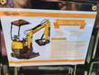 FF15 spec placard: 2,116 lb, 13.5 hp at 3,600 rpm, 0.04 cu yd bucket, 0-3 km/h travel, 6.6 L fuel, 15 L hydraulic tank