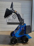 Blue AGT MX-MRW14 mini skid steer in side profile with the loader arm raised and the black bucket lifted high