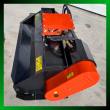 Black flail mower deck with orange drive cover and orange rear roller, hydraulic hoses across the top