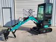 FF13 mini excavator with the boom extended, hydraulic thumb over the digging bucket and the dozer blade lowered