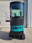 FF13 rear: perforated engine housing with a Briggs & Stratton 'Powered by B&S' decal below the glass cab, on tracks