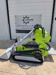 ATS T460 mini skid steer side profile, tracks, raised engine panel and bucket at the front