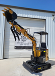 AGT H12R mini excavator with the boom raised, toothed bucket and the hydraulic thumb open above it
