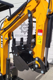 MIVA VA15 boom and stick with the serrated manual thumb folded over the black digging bucket
