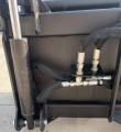 Hydraulic cylinder and quick-connect coupler block mounted on the grapple bucket frame