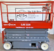 Skyjack SJIII 3226 scissor lift raised, scissor stack extended outdoors