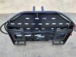 Pallet fork frame from the rear: slotted backrest, quick-attach plate, hoses and side-shift cylinders