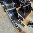 Two mini excavator buckets, different widths, with quick-attach mounting brackets