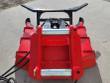 Red Captok disc mulcher from above: twin mounting pins, black push bar and hydraulic motor