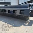 Wolverine vibratory roller attachment, black steel drum in a slotted frame with hydraulic hoses along the top