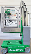 Genie GR-20 mast lift, stowed, opposite side view with green chassis and gray tires