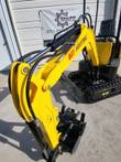 Yellow AGT QH12R mini excavator with folded boom, toothed bucket and thumb, dozer blade and rubber tracks