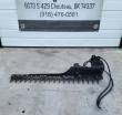 58-inch sickle mower bar laid flat: pointed cutter guards, drive motor, pin-on mount head and hoses