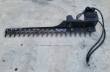 Sickle mower bar full length: pointed cutter guards, hydraulic drive motor, pin-on mount head and hoses