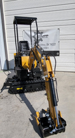 AGT H12R mini excavator with the boom swung out over the tracks and the stick and thumb lowered to the ground
