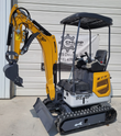 Yellow IRE18P mini excavator with canopy, toothed bucket and hydraulic thumb, dozer blade and rubber tracks
