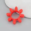 Red 8-lobe jaw coupling spider insert lying flat