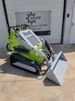 ATS T460 mini skid steer, engine access panel raised, bucket lowered, rubber tracks and hoses visible