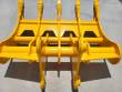 Yellow rake's frame from above: cross tubes, cut-out back plate and twin pin-boss mounting arms