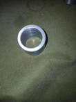 Single machined steel cylinder pin bushing, end-on view of the bore