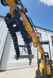 Serrated hydraulic thumb and its cylinder on the AGT H12R mini excavator stick, with hydraulic lines