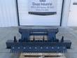 Wolverine 72-inch ripper bar, front: ripper shanks on a steel toolbar with a bolt-on rake tine comb below