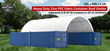 White 15 oz PVC container roof shelter, 20x40x6.5 ft, arched over two blue 40-foot shipping containers