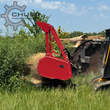 Mulched material discharging from the 72-inch forestry drum mulcher.
