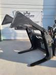 Two tapered log grapple tines with their mounting pins and lugs