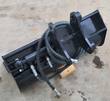 Future hydraulic tilt bucket, angled view of the quick-attach ears