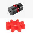 Assembled jaw coupling with the red spider visible between the hubs, and a loose spider beside it