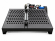 AGT landscape rake attachment, 3/4 rear view showing hydraulic motor, perforated deck and rake tines
