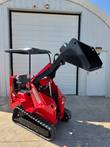 AGT SDA-140T mini skid steer with loader arm raised and bucket tilted forward
