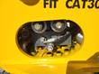 Inside the grapple rotator window: hydraulic couplers, valve block, hose fitting and socket-head bolts