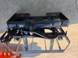 ARTEER pallet forks quick-attach top plate, wedge lugs, rotation hook, and hydraulic hose routing