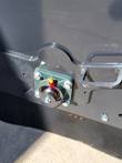 Pivot bearing block and grease zerk on the Arteer box broom's mount plate