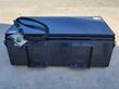 Arteer box broom's quick-attach end, full unit resting on the ground with hoses coiled