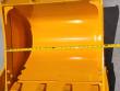 Tape measure across the inside of the yellow bucket, reading past 24 inches from wall to wall
